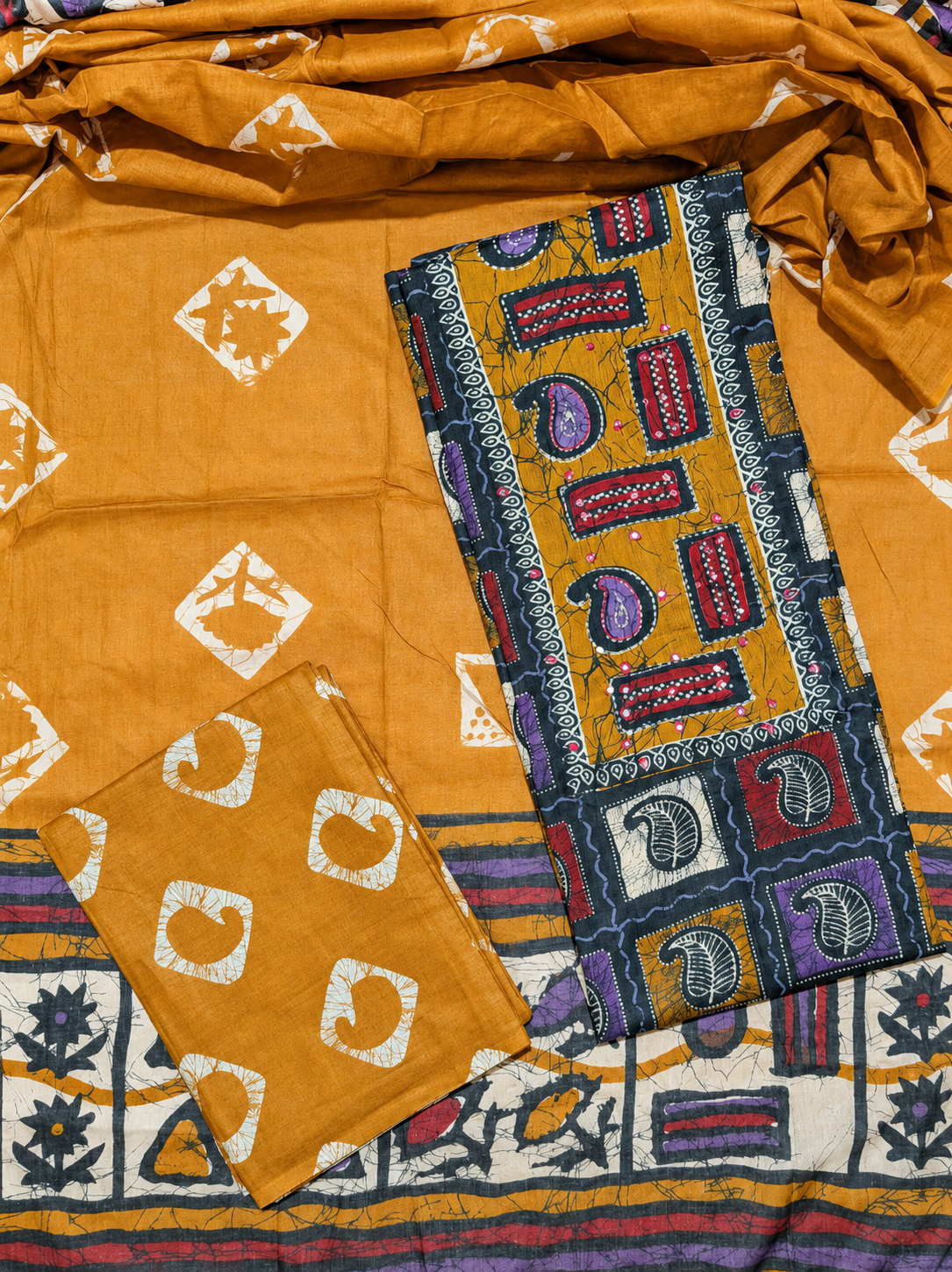 Mustard Yellow Batik Print Unstitched Cotton Suit with Artistic Paisley Panel & Printed Dupatta