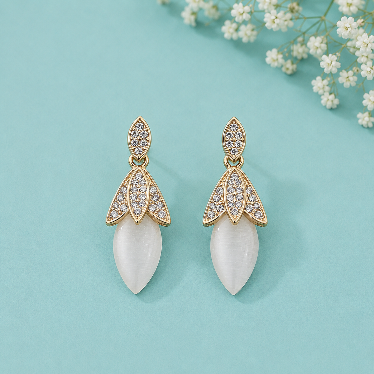 Gold Tone Crystal Leaf Drop Earrings for Women | White Cat Eye Stone Designer Earrings
